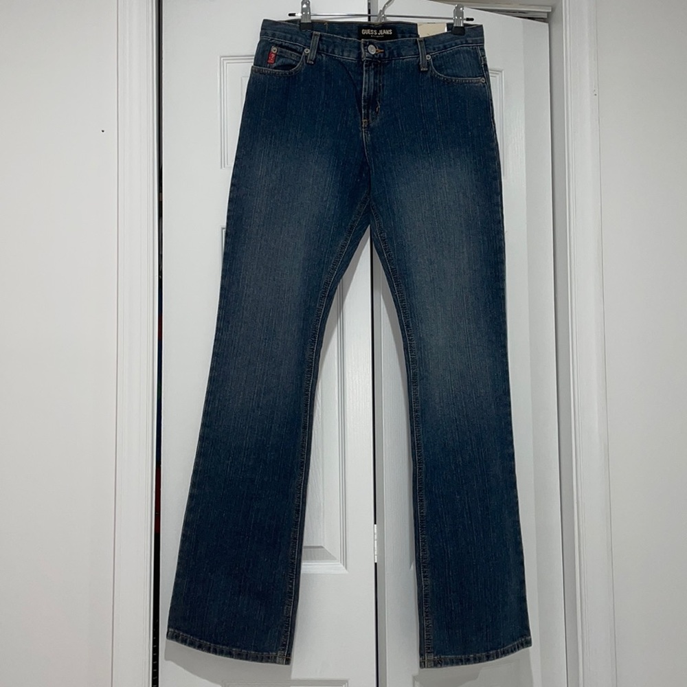Brand new dark blue flare Guess jeans with tags